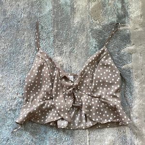 Never worn top, short, great material, light brown with white polka dots